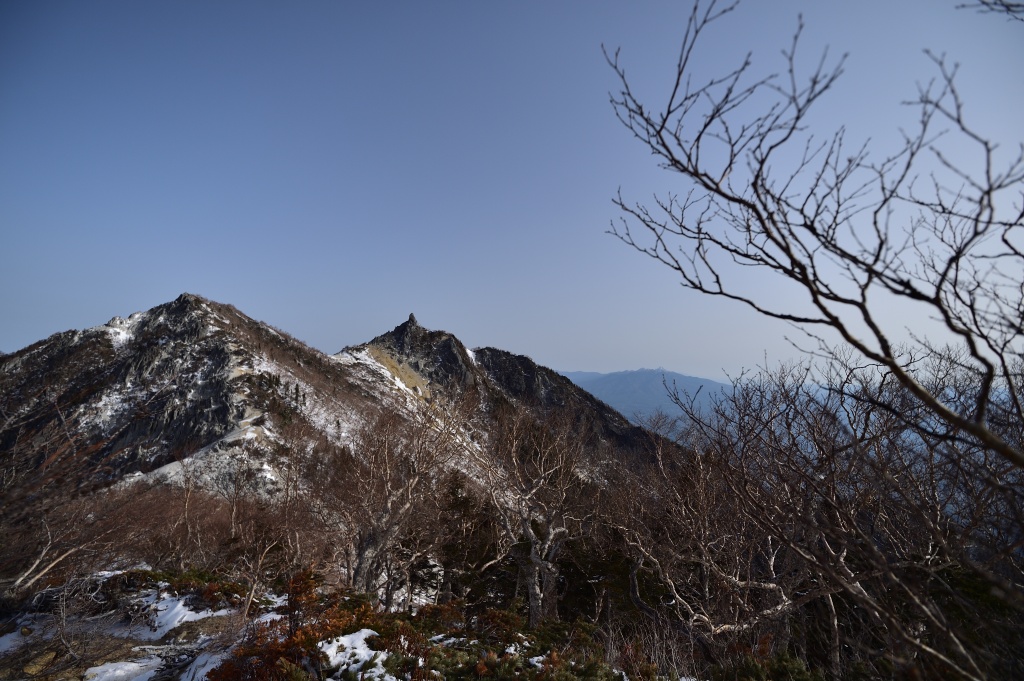 Steep snow and ice slope on north side of Kannon-dake requiring careful footwork on Hōō Sanzan