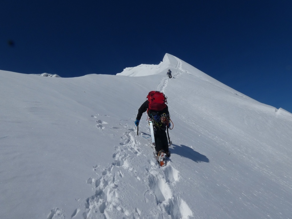 Knife-edge snow ridge on Tanigawa East Ridge with steep drops on both sides