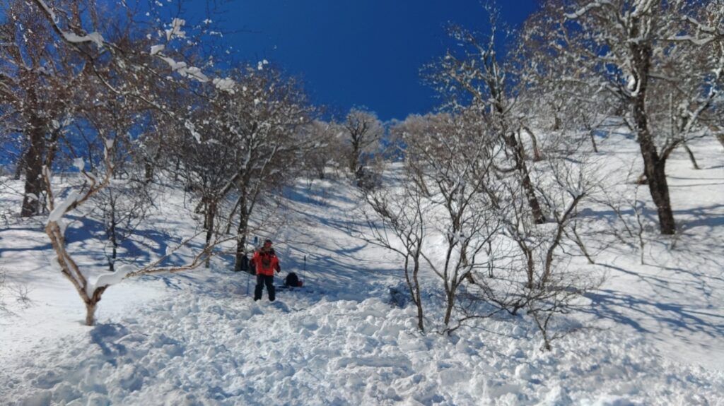 Avalanche debris field after surface slide - Kashiasahi-dake winter safety