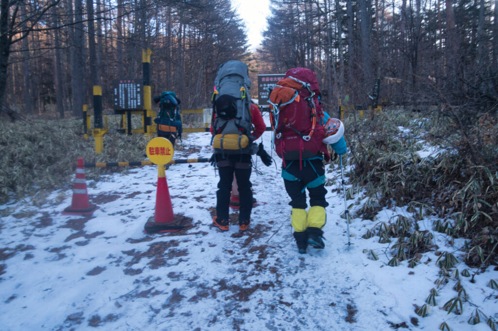 Snowy forest approach trail to Hirogawara-sawa ice climbing route Japan