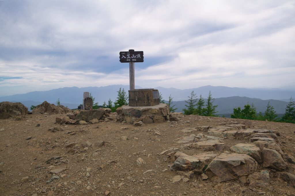 Mount Nyugasa summit marker 1955m Japanese Alps