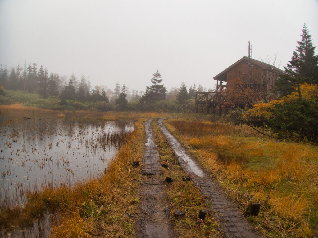 Mitsuishi-sanso mountain hut shelter interior hikers resting