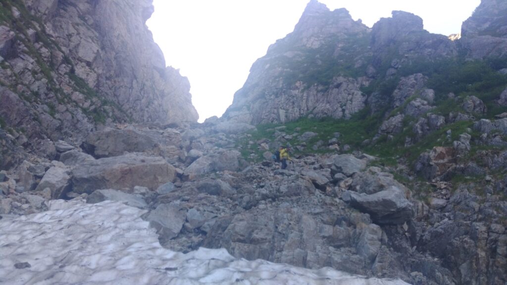 Climbers descending the Ikenotan Glacier snowfield on the final day Mt. Tsurugi