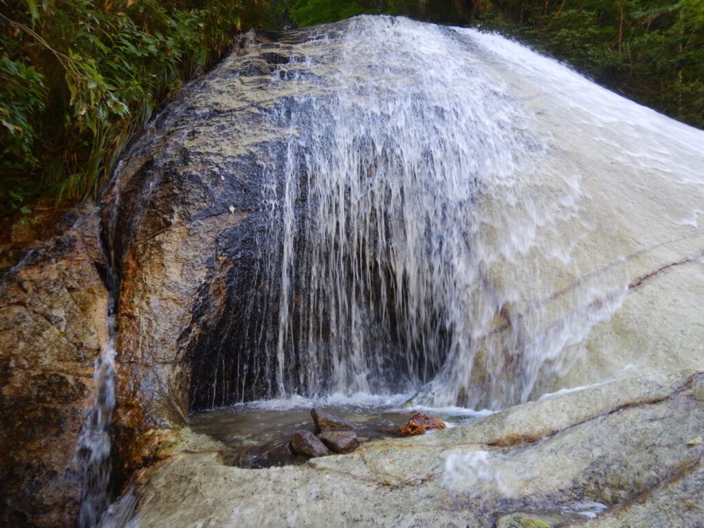 Dokuro-taki Skull Falls on Kitanomata-zawa, bright waterfall before the O-bako gorge, Hachimantai Japan