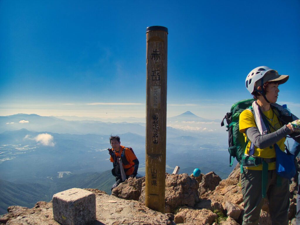 Summit panorama from Mt. Akadake – Southern Alps and Mt. Fuji in the distance, Japan