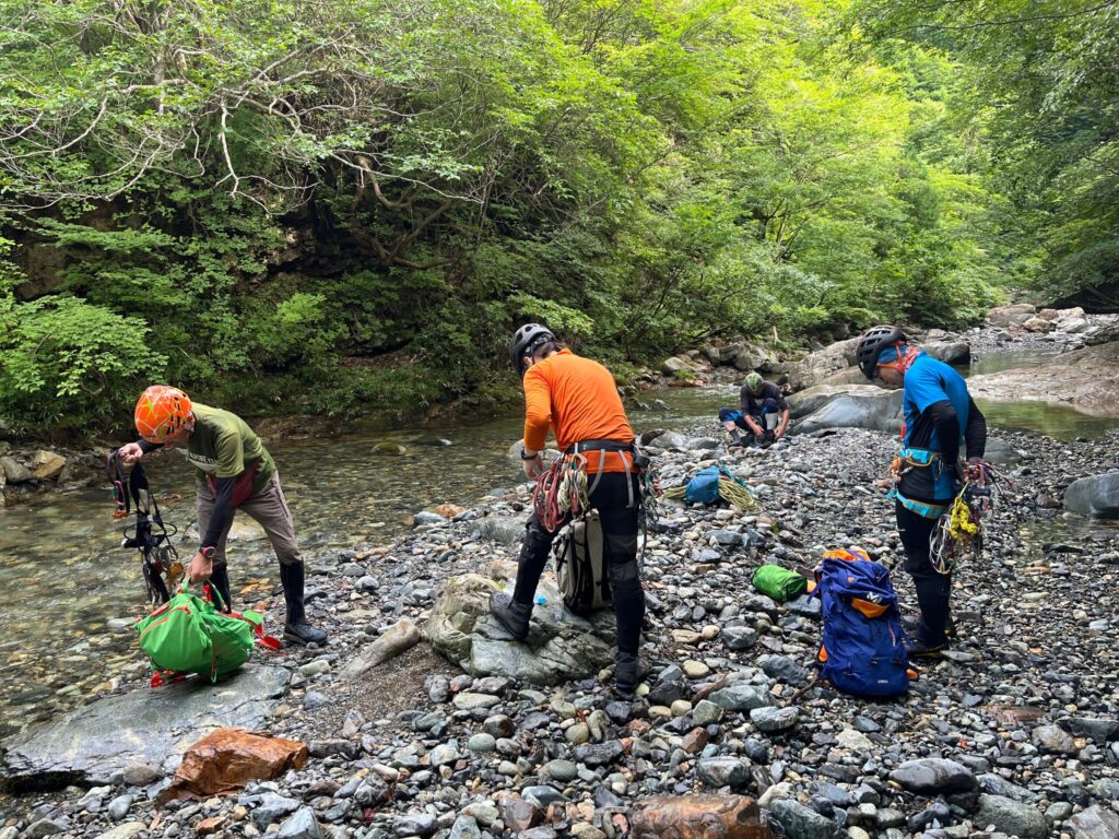 Stream climbing preparation at Sasaana-zawa entrance, Tanigawa Range Japan